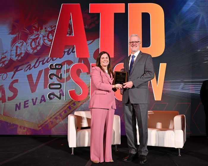 Patrick Jacobs receiving ATD award